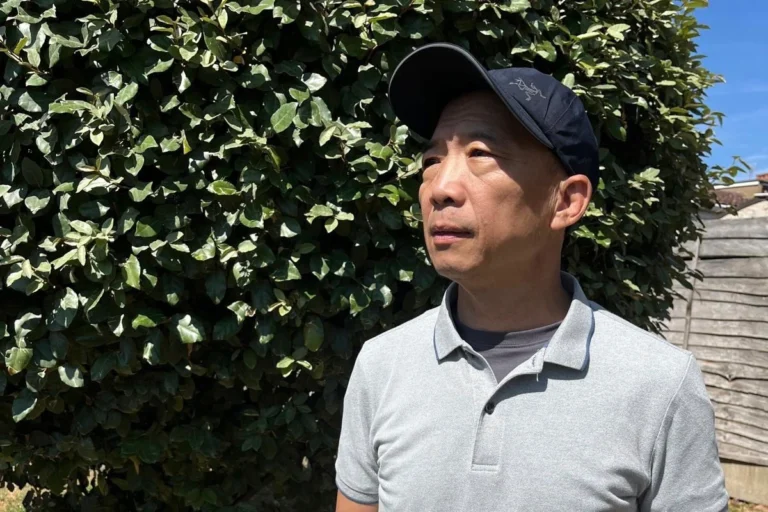 (This photo released by Hong Kong's former pro-democracy lawmaker Wu Chi-wai show's himself posing for a portrait in London, Saturday, July 25, 2026.  Photo: Wu Chi-wai via AP)