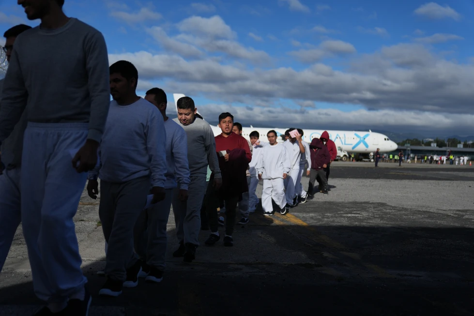 (Guatemalans deported from the U.S. arrive at La Aurora airport in Guatemala City, Dec. 30, 2025, after deplaning a repatriation flight. (AP File Photo: Moises Castillo)