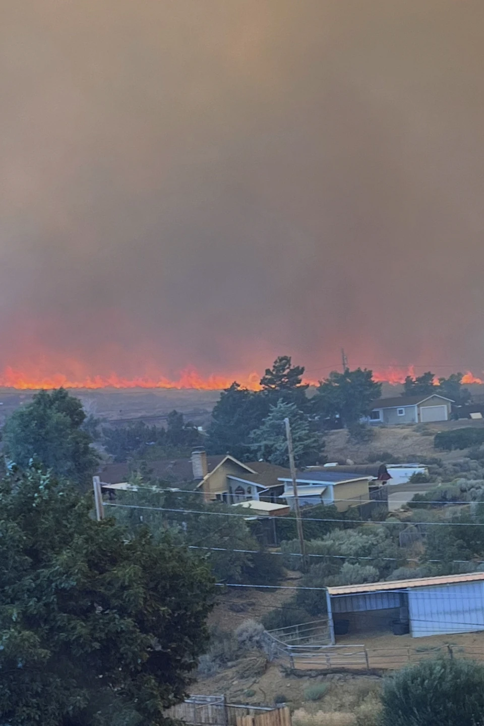 (This image provided by Cari Kieffer shows part of the Hawk fire in Reno, Nev.)