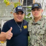 (In this photo courtesy of Katherine Delgado shows her step-father Luis Manuel Aviles, left, and her brother Joshua Aviles stand outside their home in Oct. 2025, shortly before Joshua deployed on the USS Lincoln the following month in Key West, Fla.  Photo: Katherine Delgado via the AP)