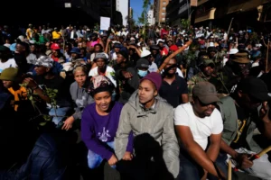 (Protesters march against illegal immigration in Johannesburg, South Africa, Tuesday, June 30, 2026.  AP Photo: Themba Hadebe)