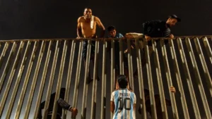 (Migrants try to cross from Morocco into the Spanish enclave of Ceuta, Friday, July 31, 2026.  AP Photo: Antonio Sempere)