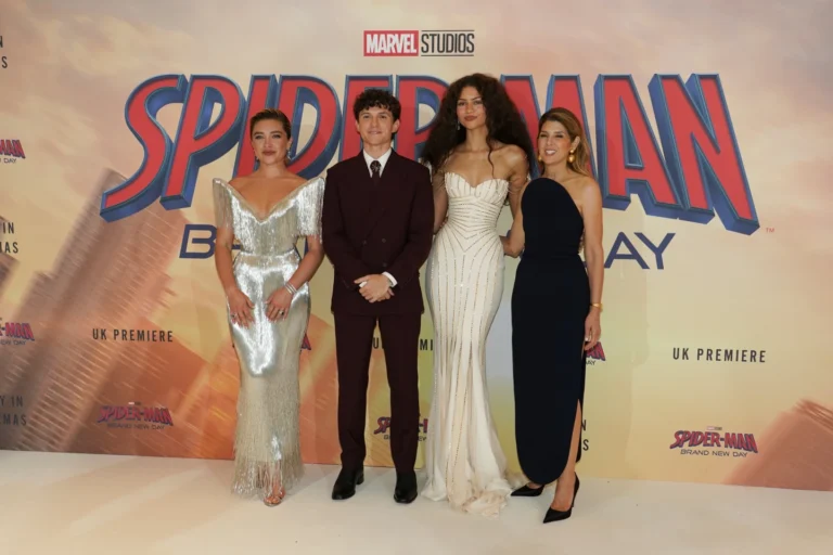 (Florence Pugh, from left, Tom Holland, Zendaya and Marisa Tomei pose for photographers upon arrival at the 'Spider-Man: Brand New Day' premiere in London, England, Wednesday, July 29, 2026. AP Photo: Alberto Pezzali)