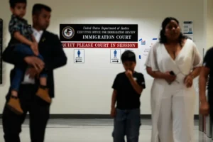 (People arrive for immigration court hearings in New York in July. AP Photo: Seth Wenig)