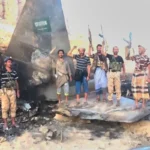 (Houthi fighters pose atop what the group described as the wreckage of a downed Saudi F-15 fighter jet in Marib province, Yemen, in an image released on Wednesday. Photo: Ansar Allah Media Office via AP)