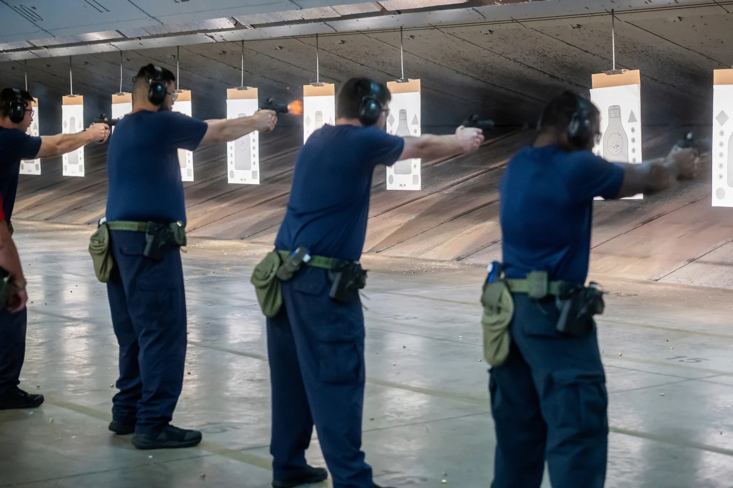 (Immigration and Customs Enforcement (ICE) trainees practice shooting handguns at the indoor firing range at the Federal Law Enforcement Training Centers (FLETC) in Brunswick, Ga., Aug. 21, 2025.  AP File Photo: Fran Ruchalski)