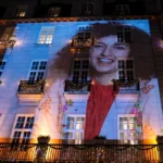 (A photo of Nobel Peace Prize recipient Narges Mohammadi is projected onto the wall of the Grand Hotel in central Oslo before the Nobel banquet on Dec. 10. 2023.  AP File Photo: Javad Parsa,  NTB Scanpix)