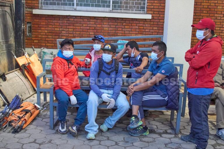 (Family members and friends of Nepali climbers gather as the bodies of Nepali climbers recovered after an avalanche on Mount Himlung lie at the morgue of a hospital in Kathmandu, Nepal, Monday, Sept. 28, 2026.  AP Photo: Niranjan Shrestha)