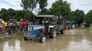 (Residents of Susta being rescued from a shelter and relocated to a safe area. Photo: Nepal Army)