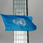 (The UN flag flies on a stormy day at the United Nations during the United Nations General Assembly, Sept. 22, 2022. AP File Photo: Ted Shaffrey)