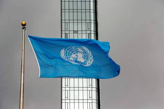 (The UN flag flies on a stormy day at the United Nations during the United Nations General Assembly, Sept. 22, 2022. AP File Photo: Ted Shaffrey)