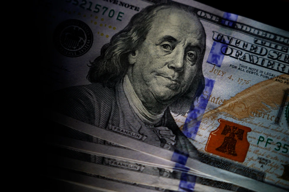 (A portrait of Benjamin Franklin is featured on a U.S. $100 bill in Marple Township, Pa., on July 14, 2022. (AP File  Photo: Matt Slocum)