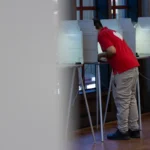 (A voter fills out their ballot for the primary election at Sacramento City College on June 2, 2026. Photo Curtsy: Miguel Gutierrez Jr., CalMatters)