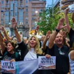 (Local residents protest the Spanish government's handling of the Ceuta border crisis, two months after it occurred, in the Spanish enclave of Ceuta, Wednesday, Sept. 30, 2026. Banners read in Spanish: "Ceuta does not give up".  AP Photo: Bernat Armangue)