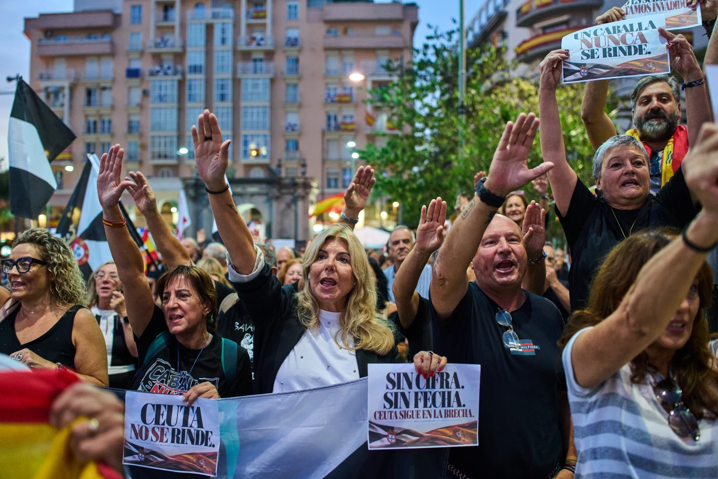 (Local residents protest the Spanish government's handling of the Ceuta border crisis, two months after it occurred, in the Spanish enclave of Ceuta, Wednesday, Sept. 30, 2026. Banners read in Spanish: "Ceuta does not give up".  AP Photo: Bernat Armangue)