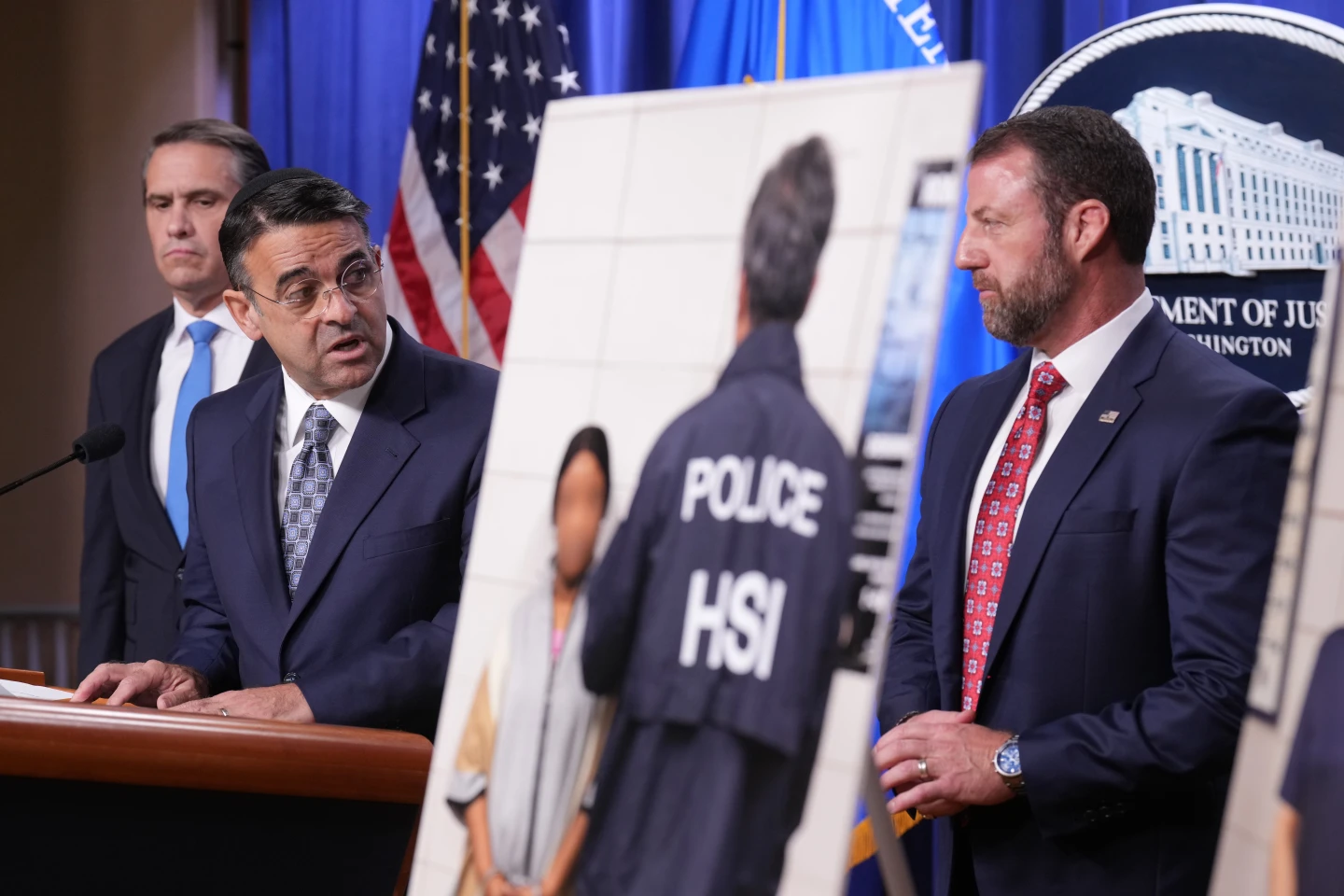 (Daniel Rosen, U.S. Attorney for the District of Minnesota, speaks during a news conference at the Department of Justice, Wednesday Sept. 30, 2026, in Washington, as Attorney General Todd Blanche, left, and Secretary of Homeland Security Markwayne Mullin, look on. (AP Photo: Jacquelyn Martin)