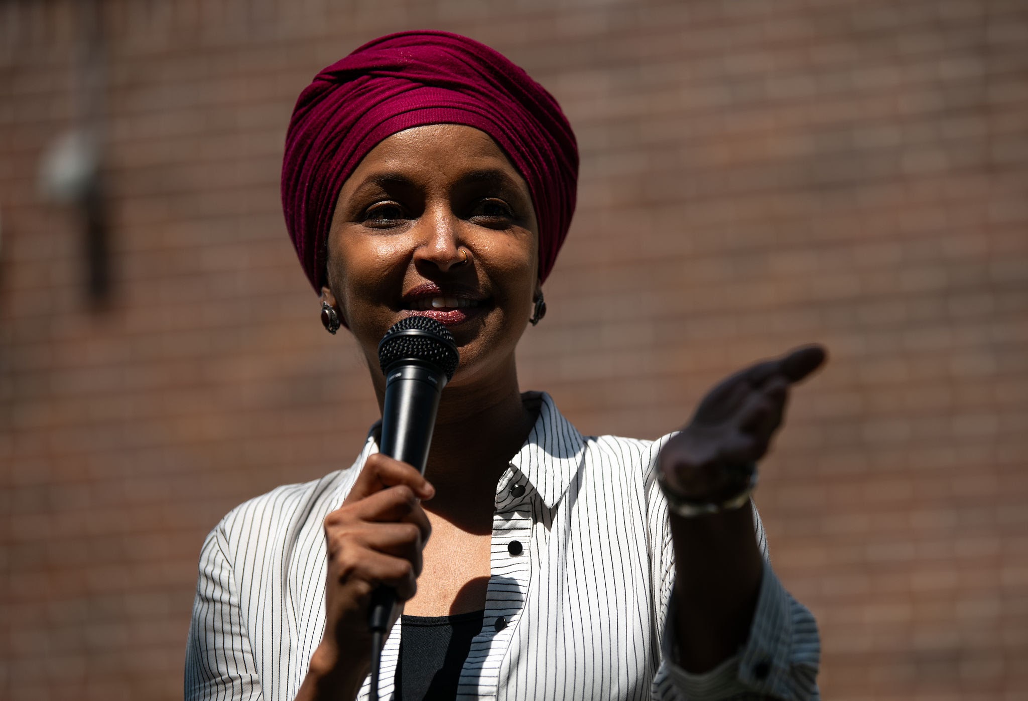 MINNEAPOLIS, MINNESOTA - AUGUST 8: U.S. Rep. Ilhan Omar (D-MN) speaks during a get out the vote event with Democratic Senate candidate, Minnesota Lt. Gov. Peggy Flanagan, at Cedar Field Park on August 8, 2026 in Minneapolis, Minnesota. Flanagan and Rep. Angie Craig (D-MN) will be vying for the Democratic nomination in the state's August 11 primary election. (Photo by Stephen Maturen/Getty Images)