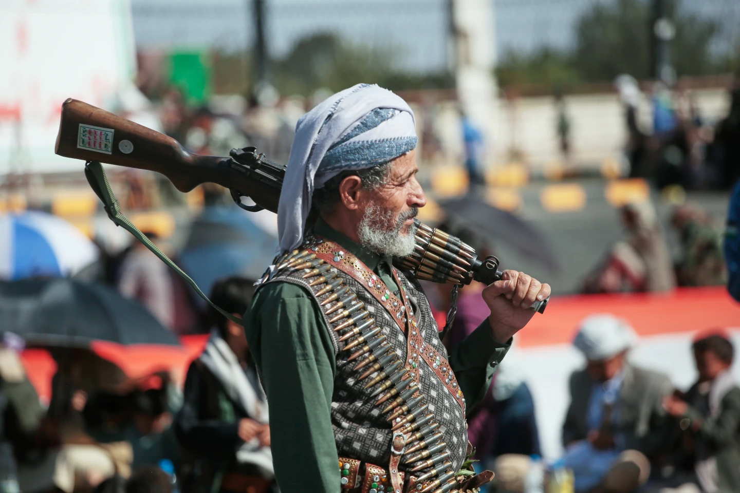 (A supporter of Yemen's Houthi rebels carries his rifle during a rally in support of the group, in Sanaa, Yemen, Friday, Oct. 9, 2026.  AP Photo: Osamah Abdulrahman)