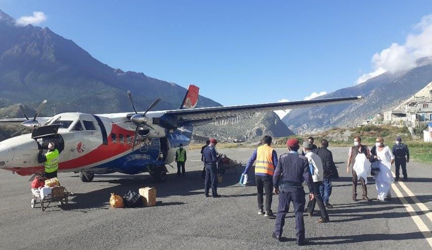 (Passengers arriving in Mustang aboard a Twin Otter aircraft operated by the private airline Summit Air. Photo: Harikrishna Sharma)