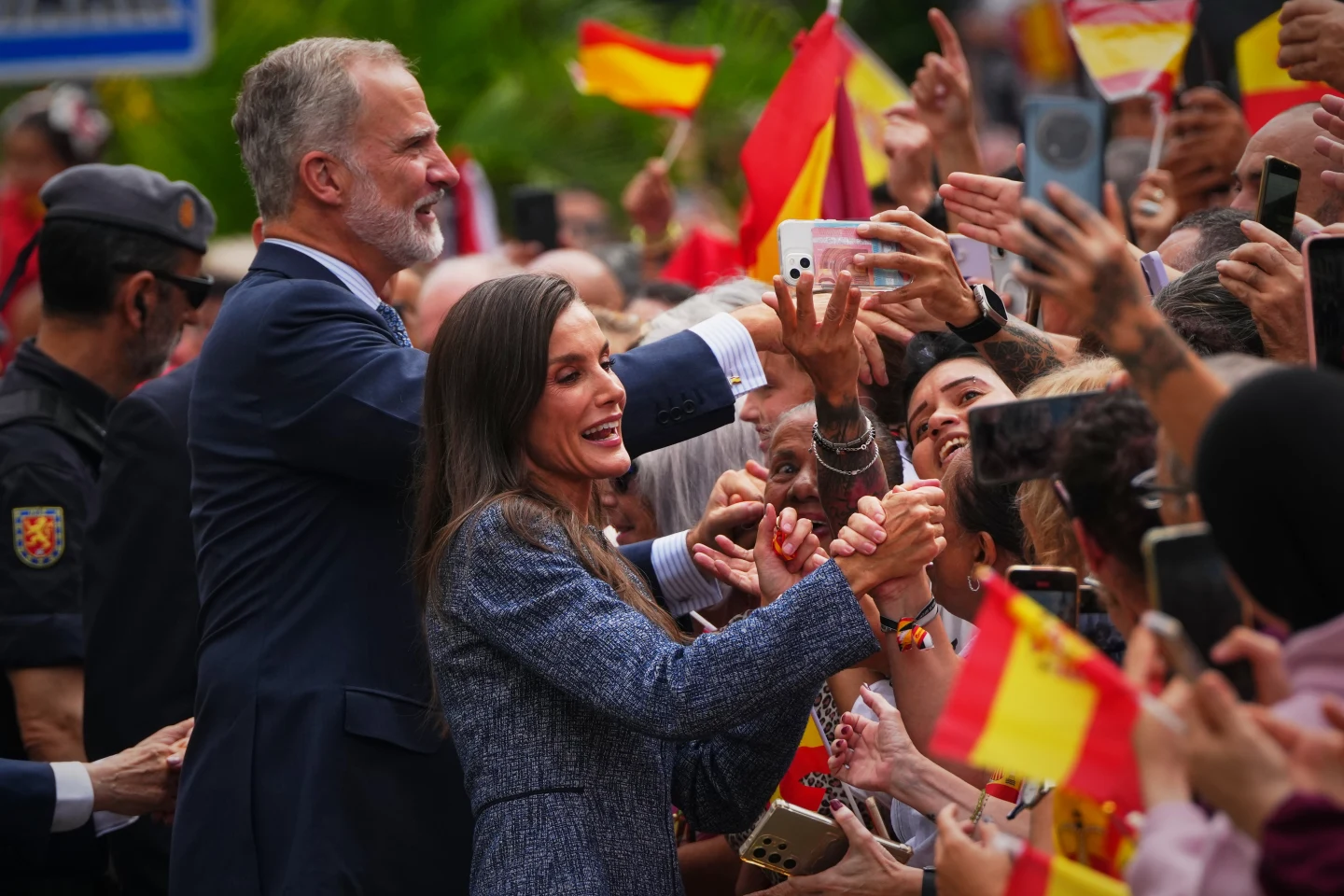 (Spain's King Felipe VI and Queen Letizia greet the crowd during their visit to the Spanish enclave of Ceuta, Tuesday, Oct. 13, 2026.  AP Photo: Manu Fernández)