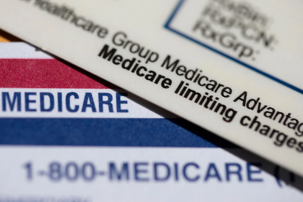 (A Medicare Advantage PPO card rests on top of a Medicare card in Portland, Ore., June 10, 2024.  AP File Photo: Jenny Kane)