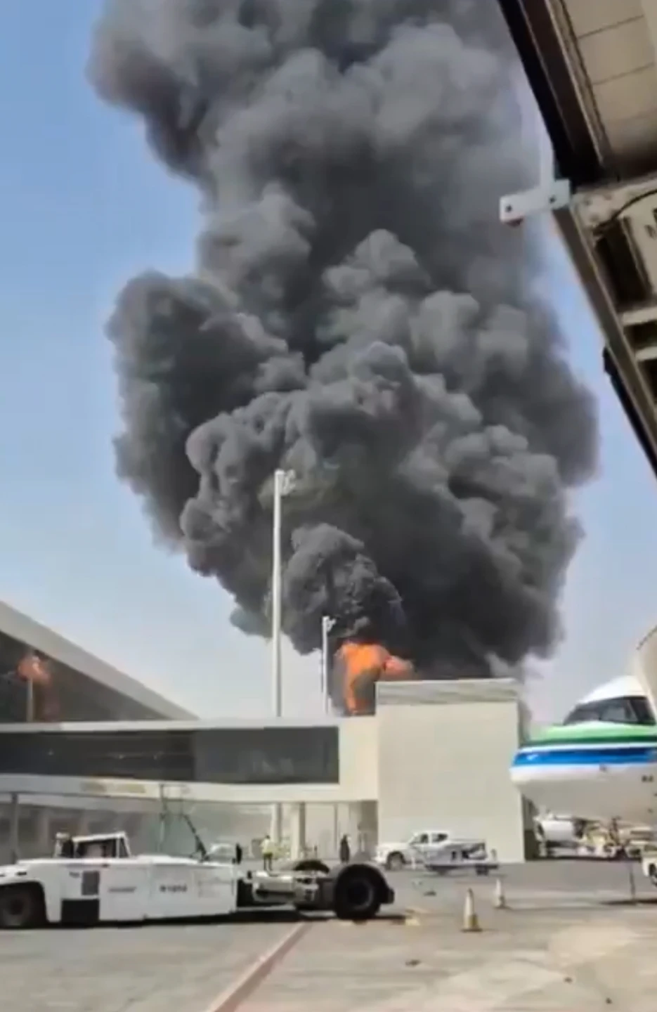 (This image from video obtained and verified by AP shows thick black smoke and flames rising from a fire at King Khalid International Airport in Riyadh, Saudi Arabia, Friday, Oct. 9, 2026. (UGC via AP)