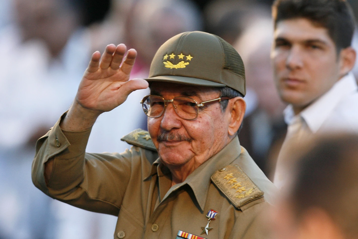 (Cuba's acting President Raul Castro waves to journalists in front the Museum of the Revolution in Havana on March 13, 2007. (AP File Photo: Javier Galeano)