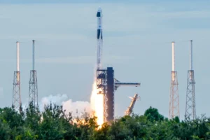 (A SpaceX Falcon 9 rocket with a crew of four launches from pad 40 at the Cape Canaveral Space Force Station in Cape Canaveral, Fla., Thursday, Oct. 1, 2026.  AP Photo: John Raoux)