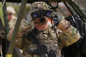 (U.S. Army personnel keep watch over the U.S.-Mexico border in Roma, Texas, Thursday, Oct. 8, 2026.  AP Photo: Eric Gay)